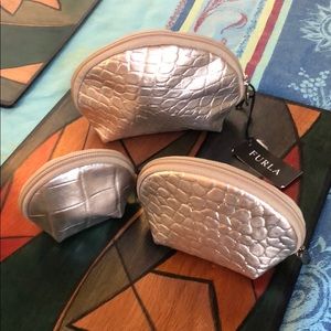 3 Furla carrying cases
